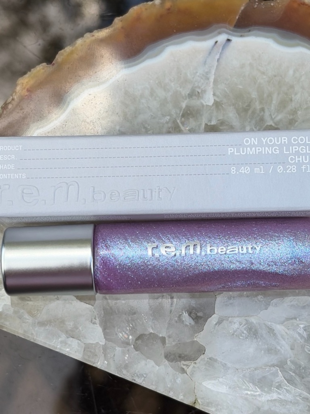 REM Beauty Plumping Lipgloss in Chuckie - Iridescent Lavender